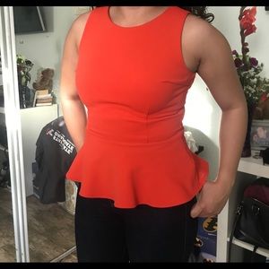 Orange peplum shirt